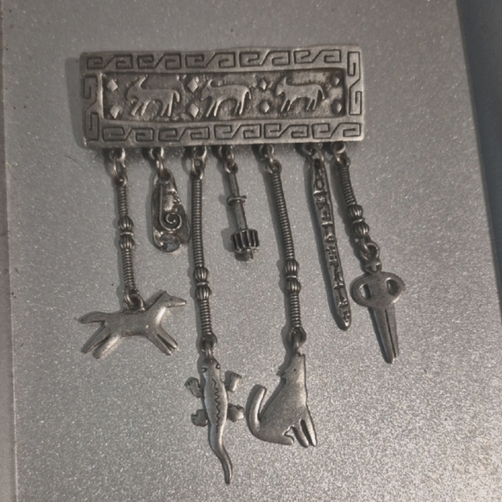 Native American Style JJ 1988 Brooch Symbols Wolf Horse Lizard And More